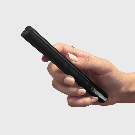 pen stun gun black in hand