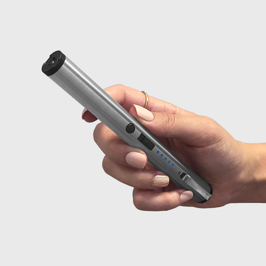 pen stun gun in hand